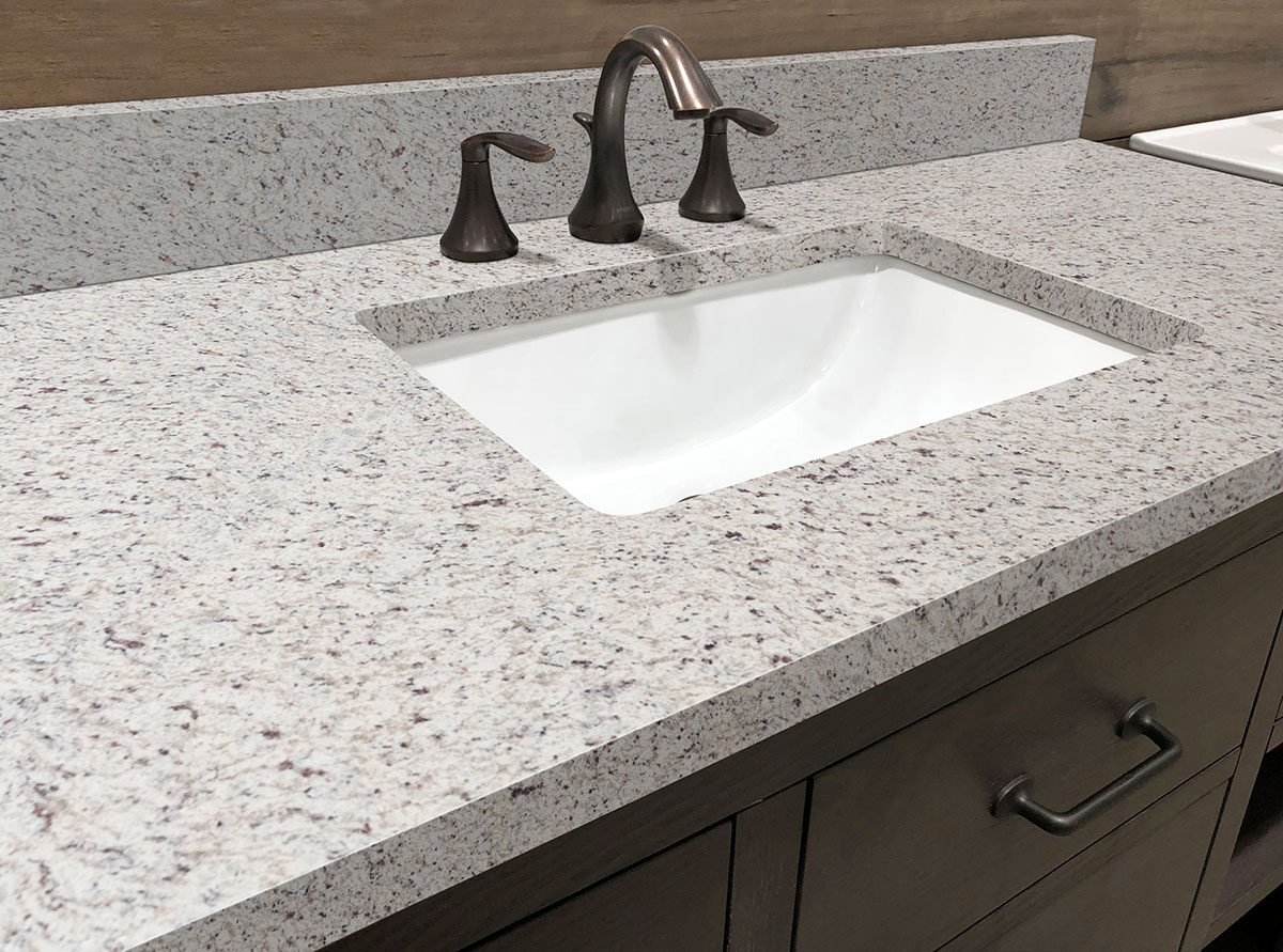 White Ornamental Granite countertop installed — view 2