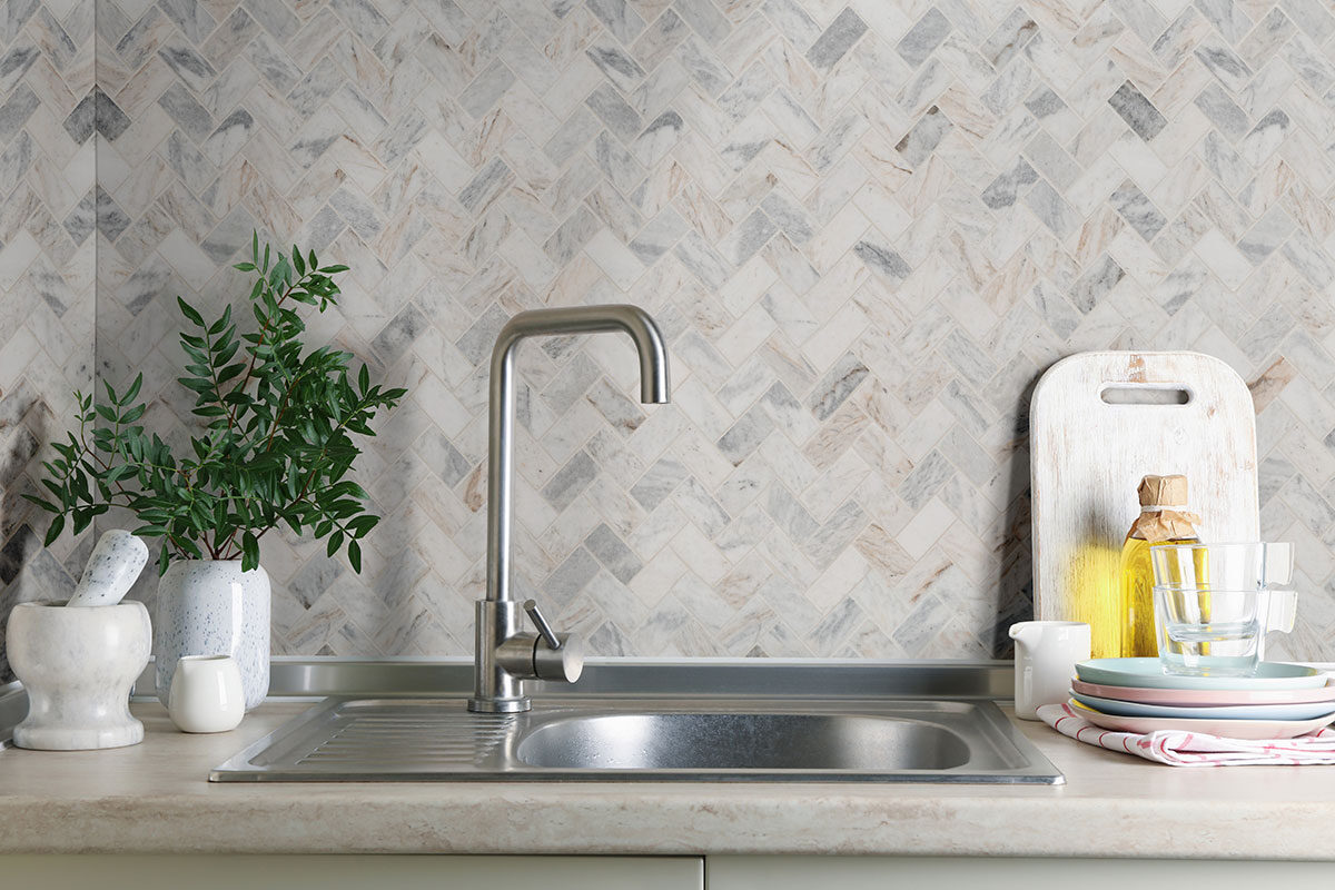 Capri Blue 1x2 Herringbone Honed Subway Tile backsplash installed — view 2