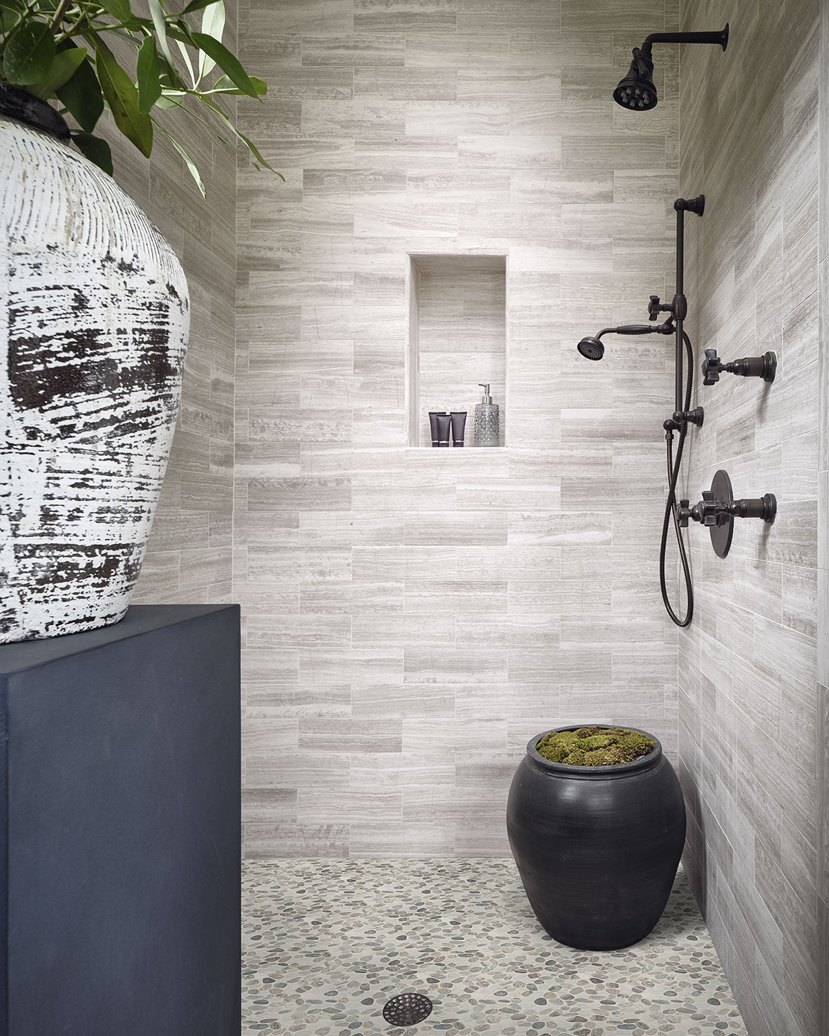 Puebla Greige Pebble backsplash in a bathroom — view 2