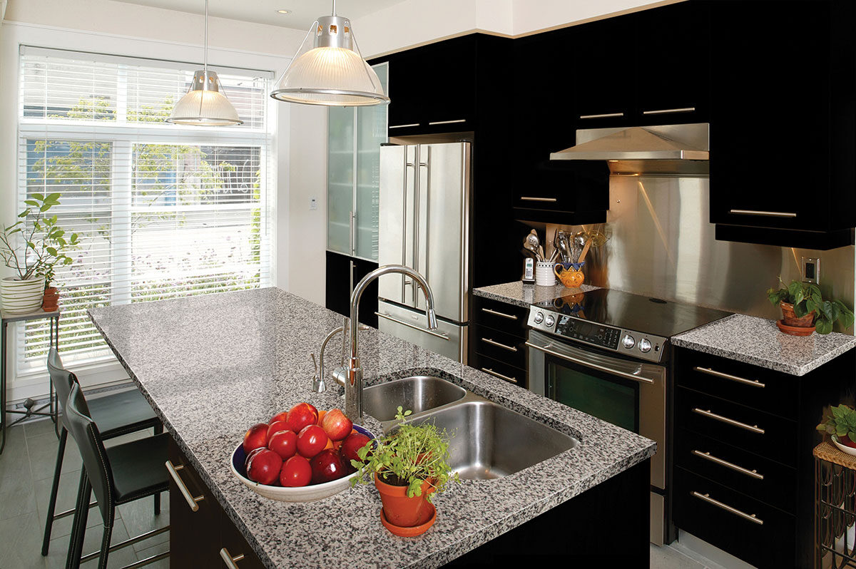 Crema Atlantico Granite countertop installed — view 2