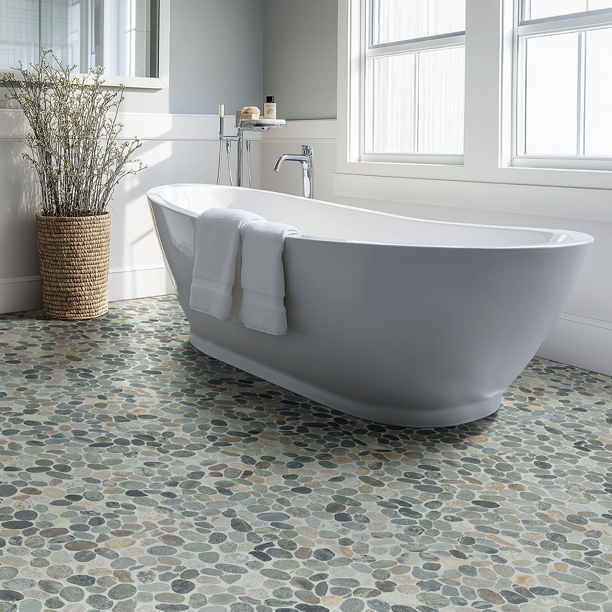 Sliced Rainforest Pebble backsplash in a bathroom — view 2