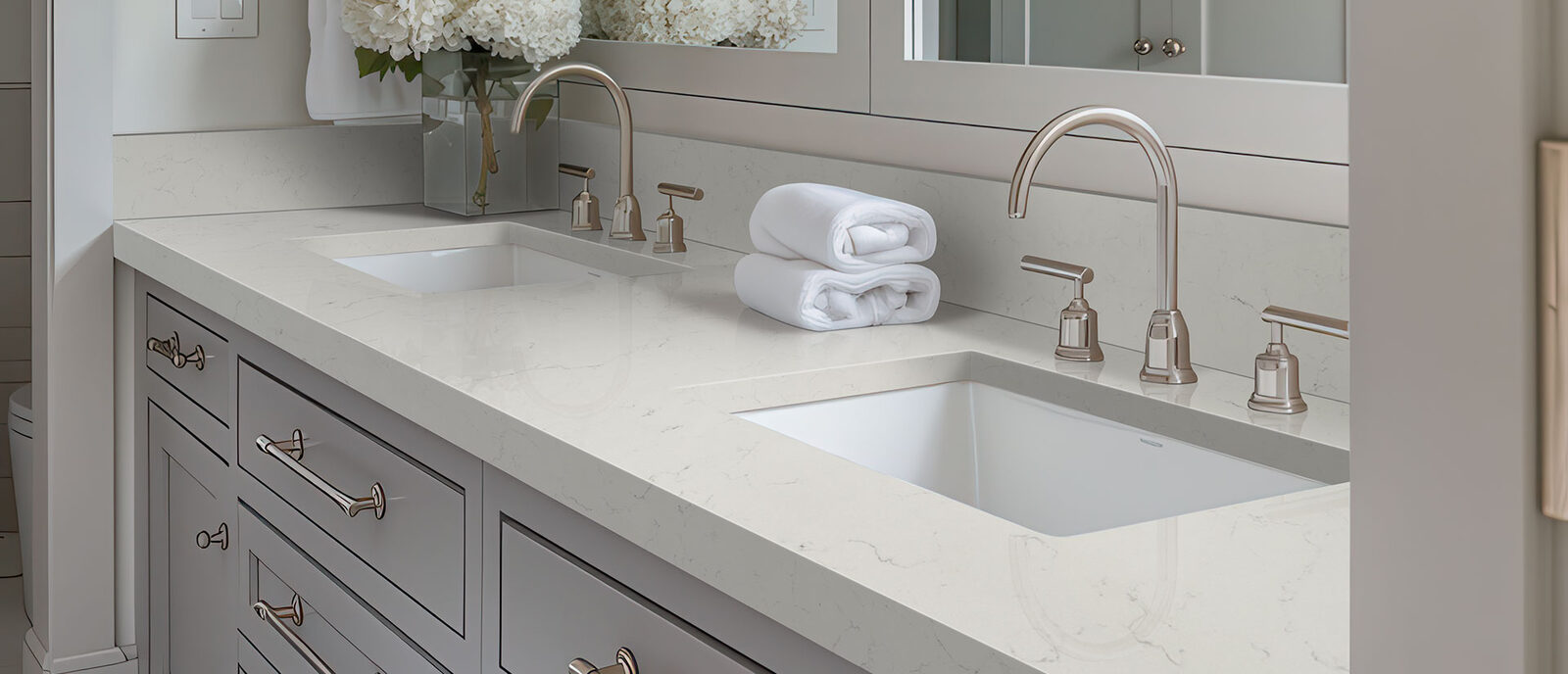 Carrara Delphi Quartz countertop in a bathroom