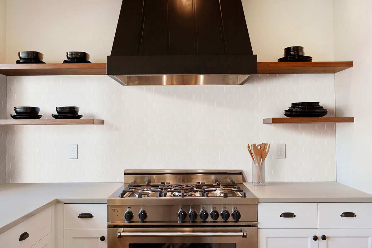 White Matte 2” Hexagon Mosaic Tile backsplash installed — view 2