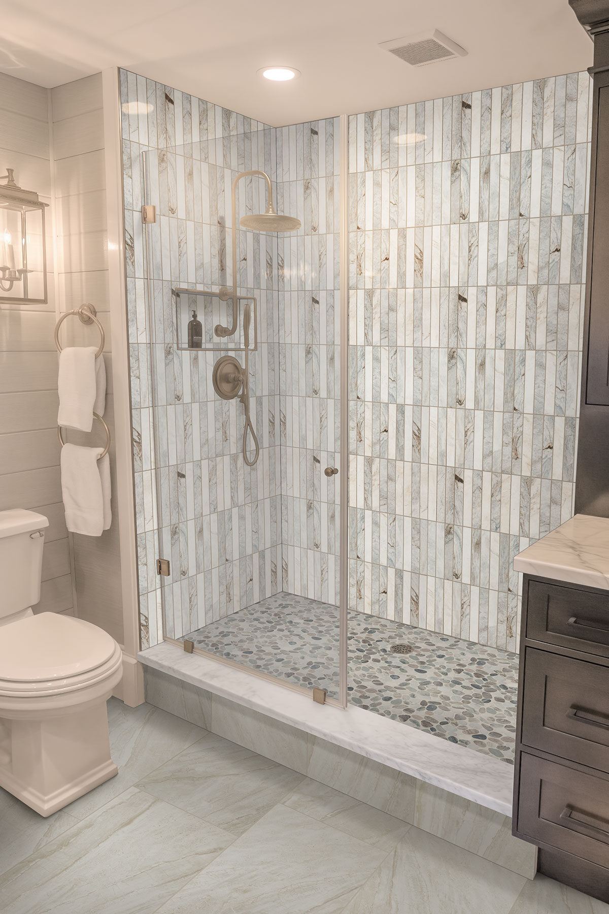 Puebla Greige Pebble backsplash in a bathroom
