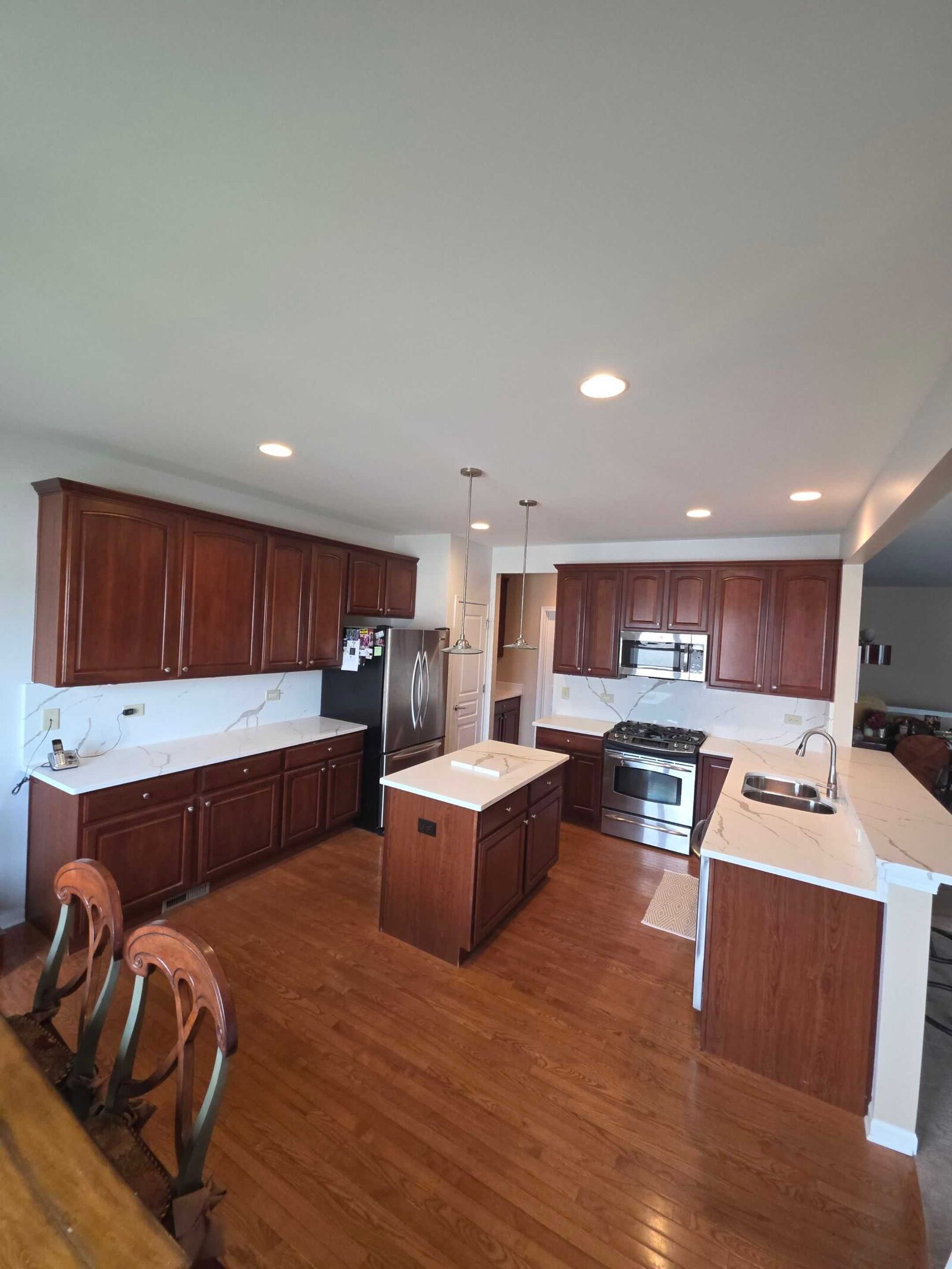 Cherry kitchen, island and peninsula
