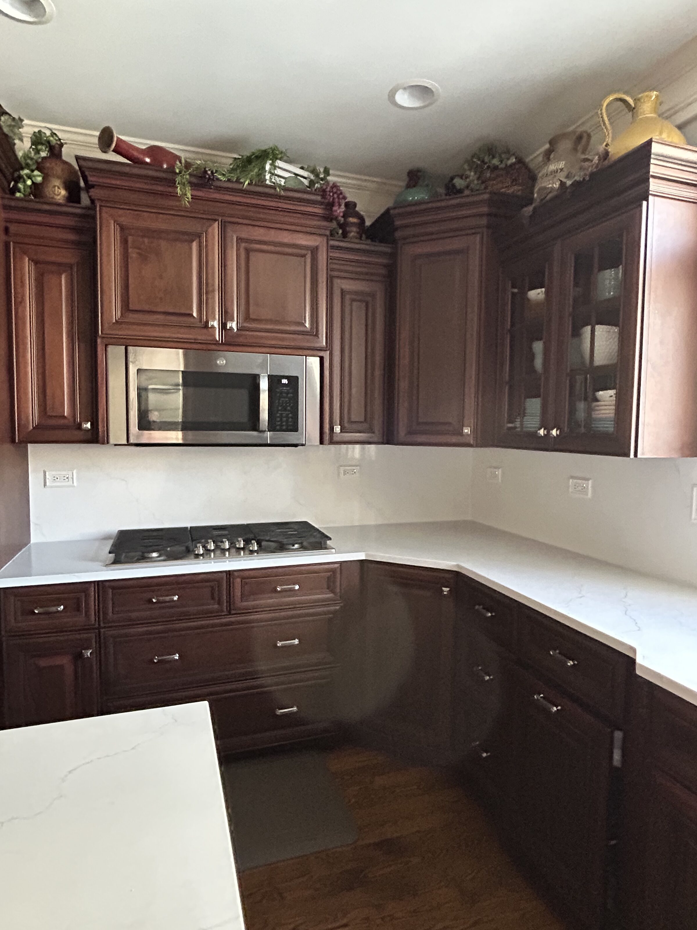 Cherry kitchen under a tin ceiling