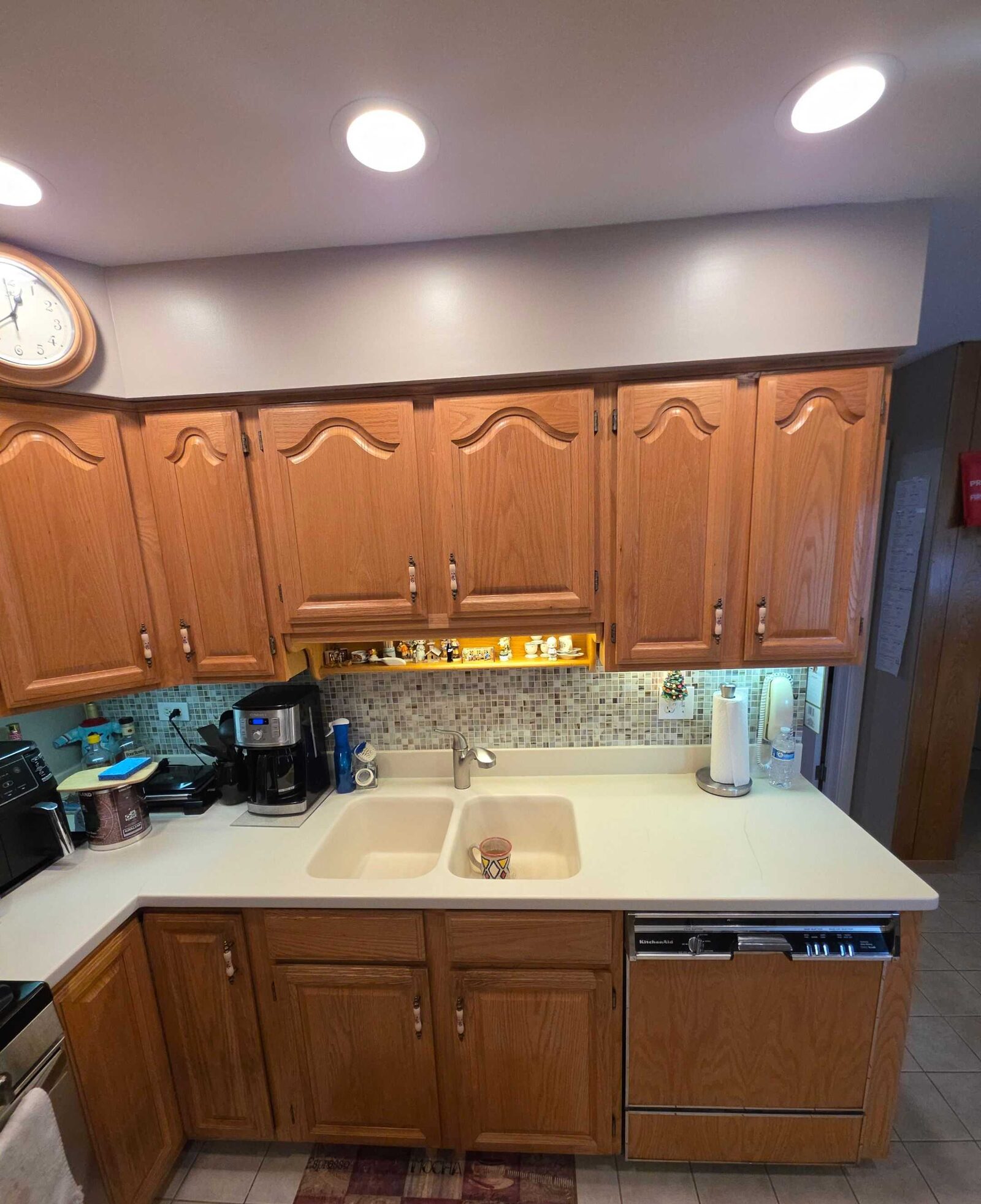 The same L before, in almond laminate with the dishwasher door standing open