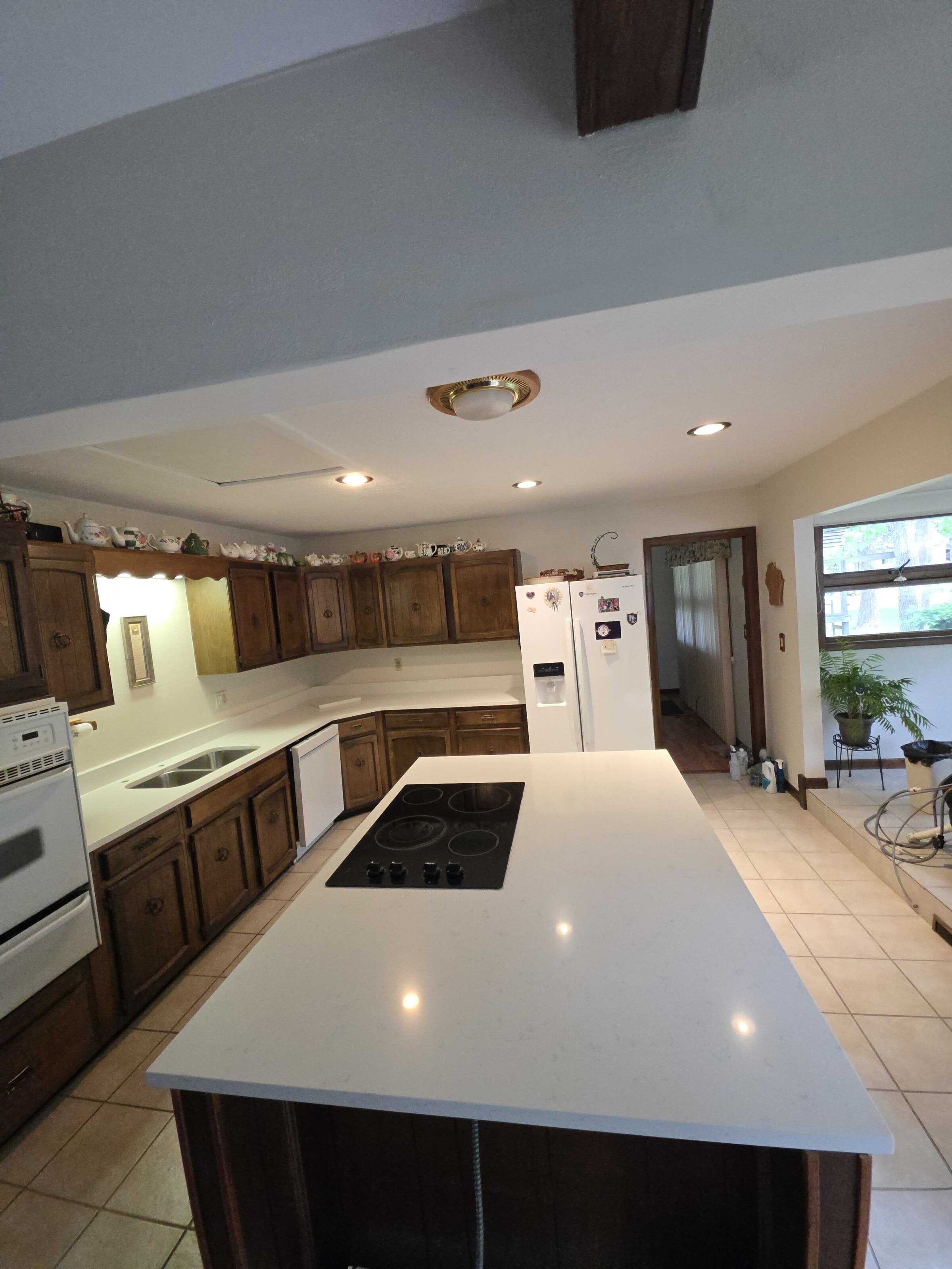 Dark oak kitchen, white quartz