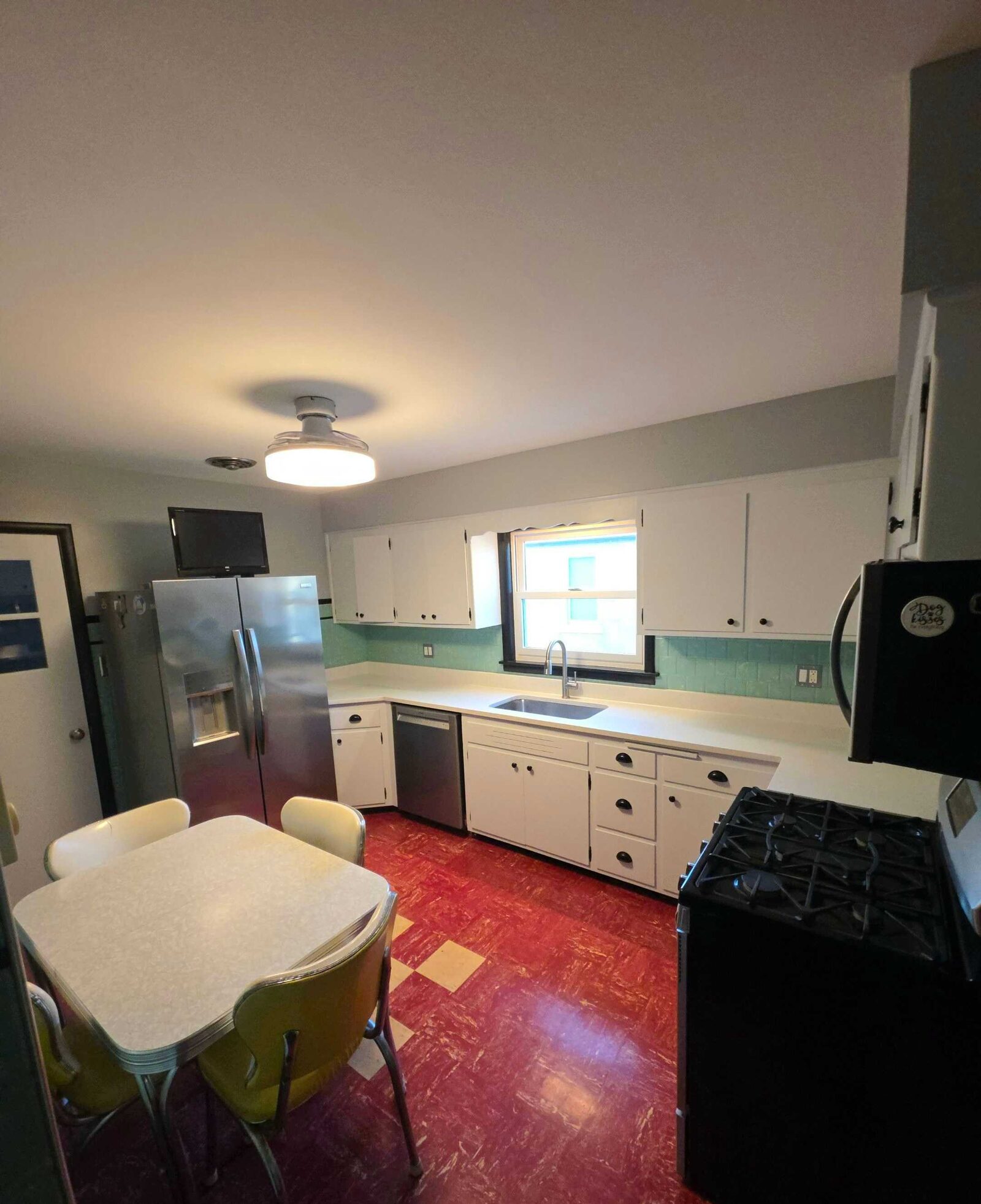 The completed kitchen with its chrome-legged dinette set back in place