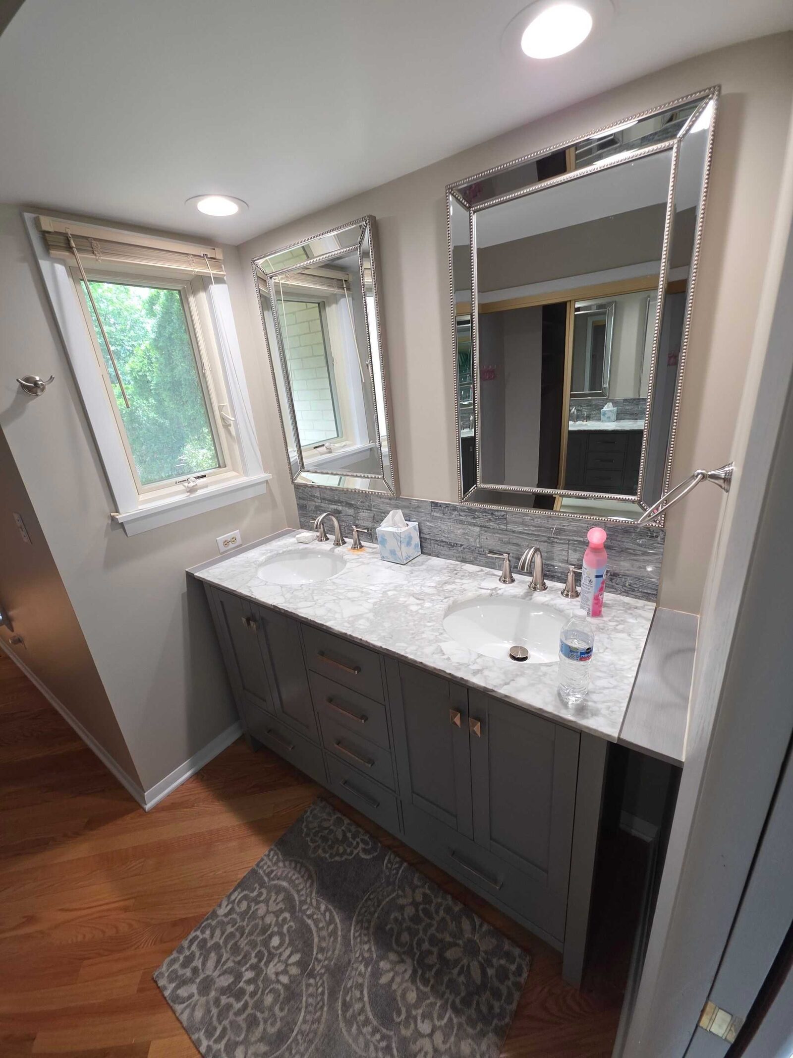 The vanity from the other end, the quartz vein carrying between the two basins