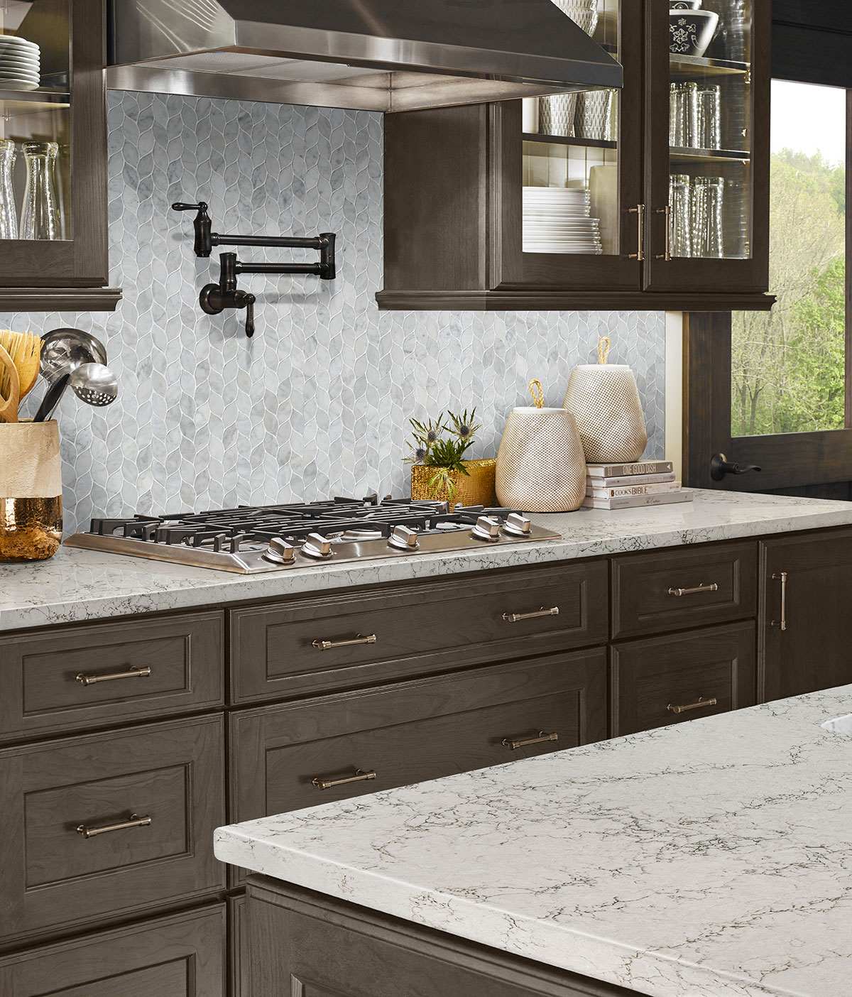 Carrara White Blanco Pattern Honed Tile backsplash in a kitchen