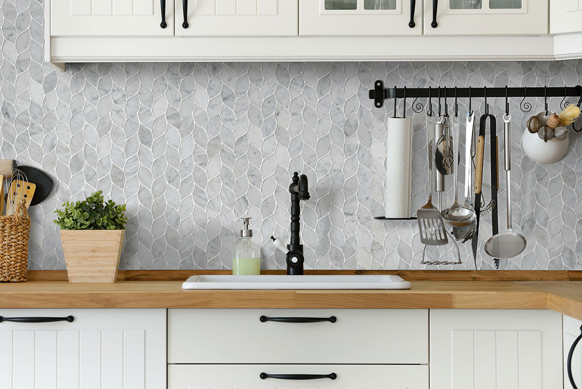 Carrara White Blanco Pattern Honed Tile backsplash installed — view 2