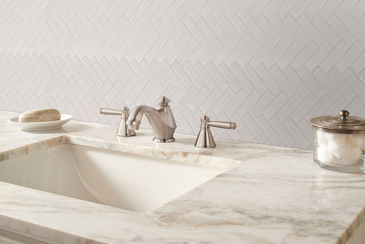 White Glossy Herringbone Mosaic backsplash installed