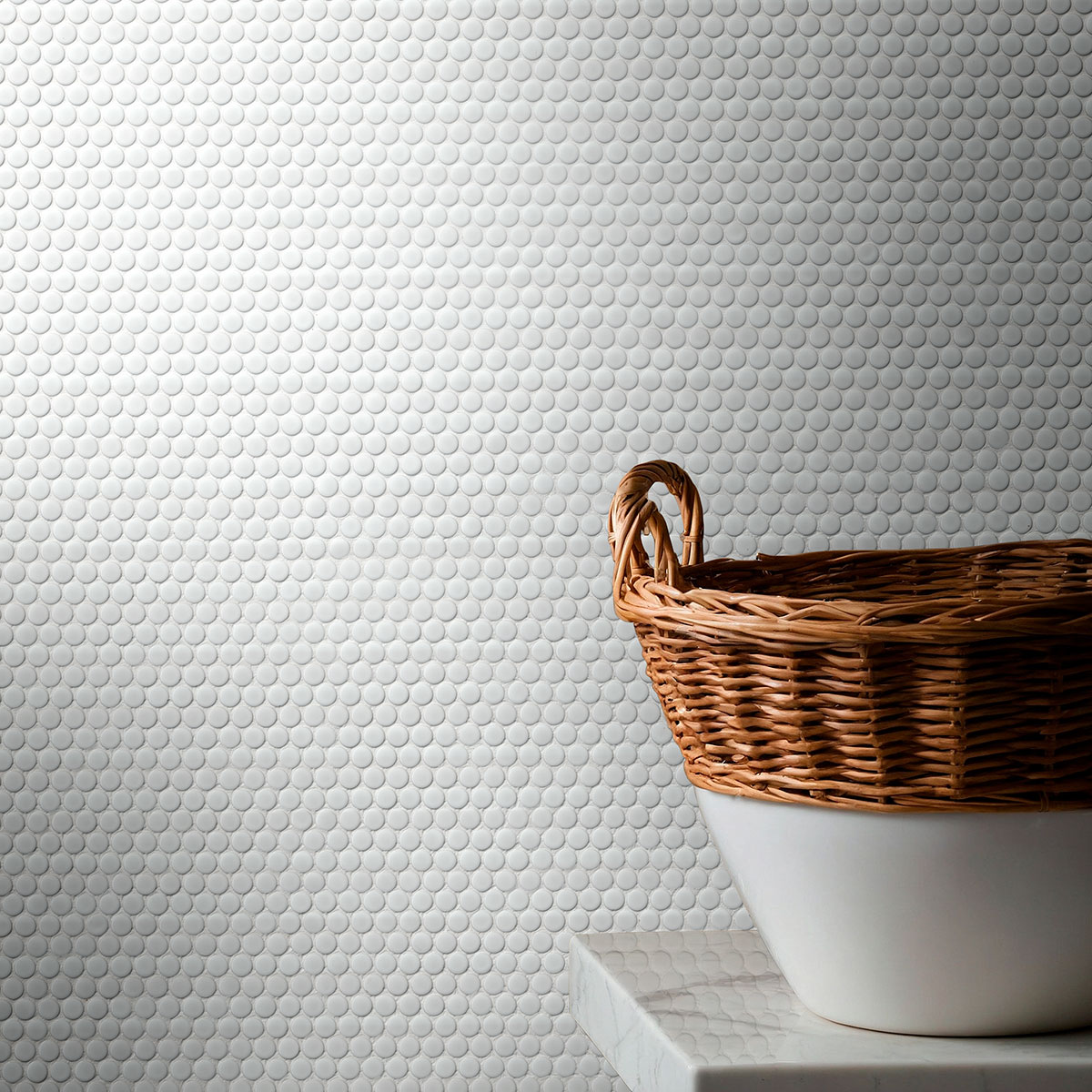 White Glossy Penny Round Mosaic backsplash in a laundry room