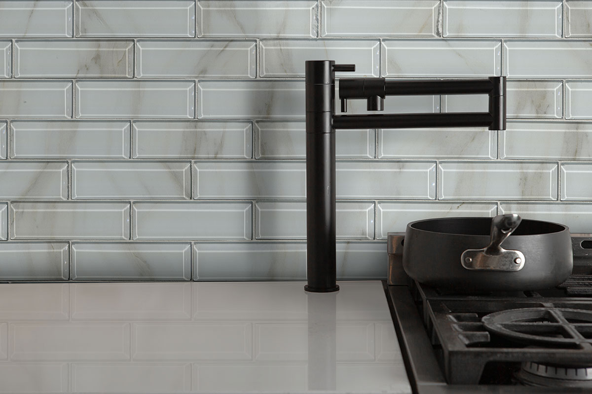 Ivory Amber Beveled Subway 8mm backsplash in a kitchen — view 2