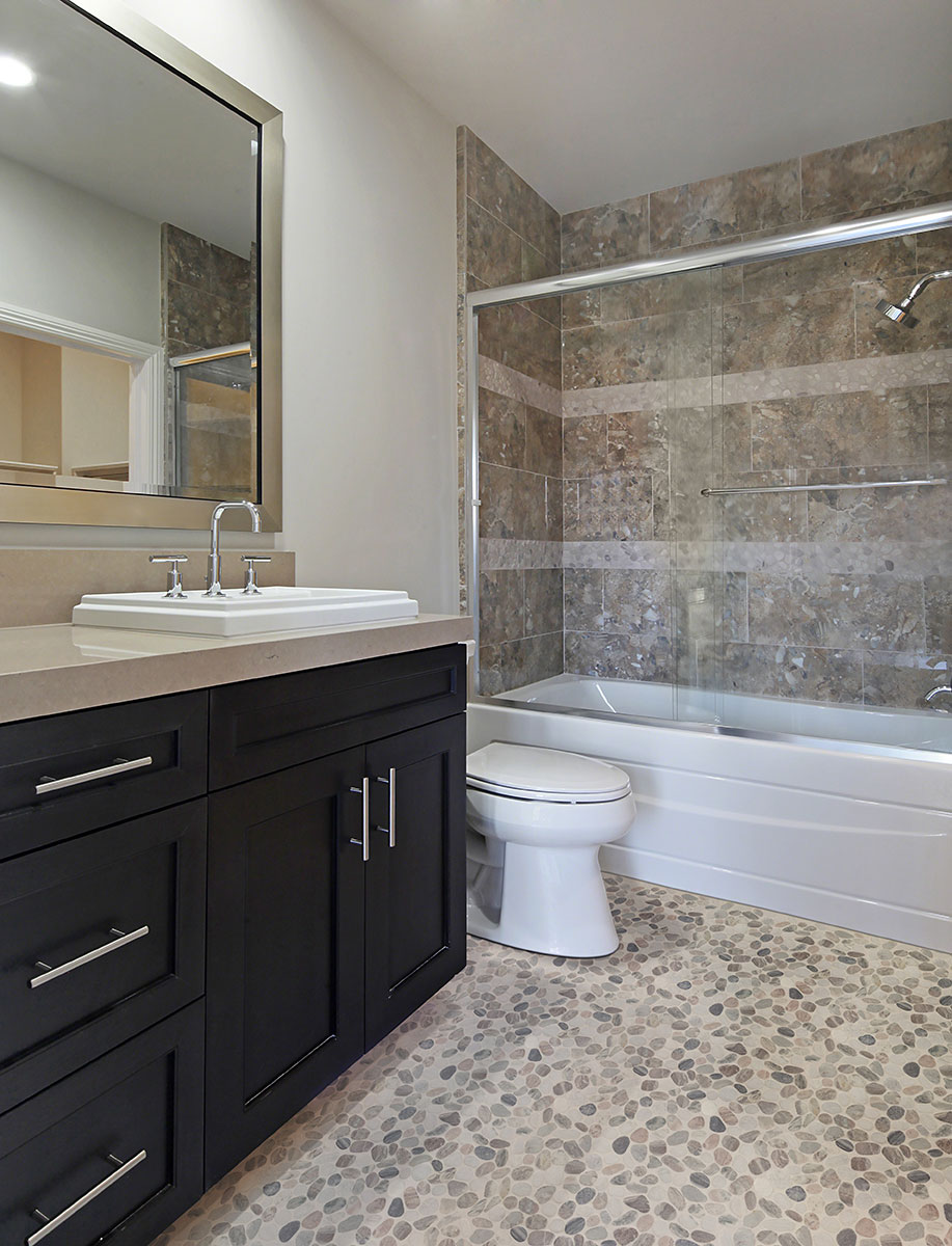 Puebla Greige Pebble backsplash installed — view 3