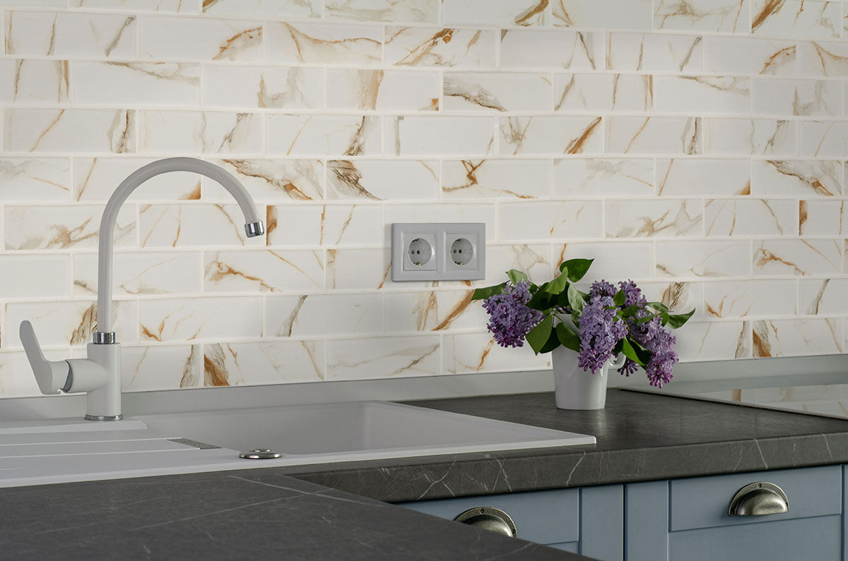 Calacatta Gold Matte Subway Tile 2x6 backsplash installed